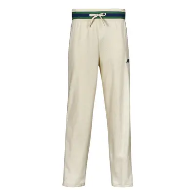 New Balance SGH BASKETBALL TRACK PANT Futónadrágok / Melegítők Bézs